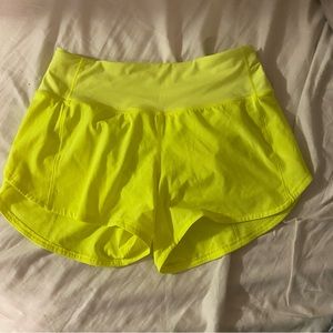 Lululemon highlighter yellow shorts size 4 Tall